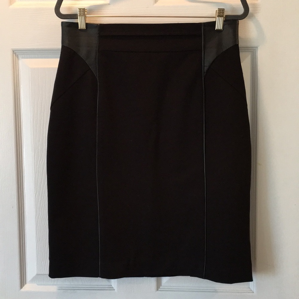 Knee length skirt with faux leather detail